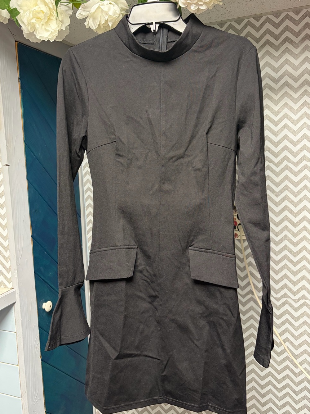 Black Long-Sleeve Mini Dress with Faux Flap Pockets & Bell Sleeves